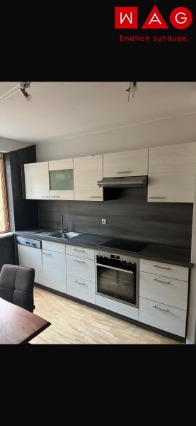 Modernes Wohnen im Holzhaus!  3 Raumwohnung mit Balkon & Carport!